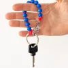 Tomfoolery Blue & Neon Pink Perlen Short Wooden Beaded iPhone & Keychain Sale