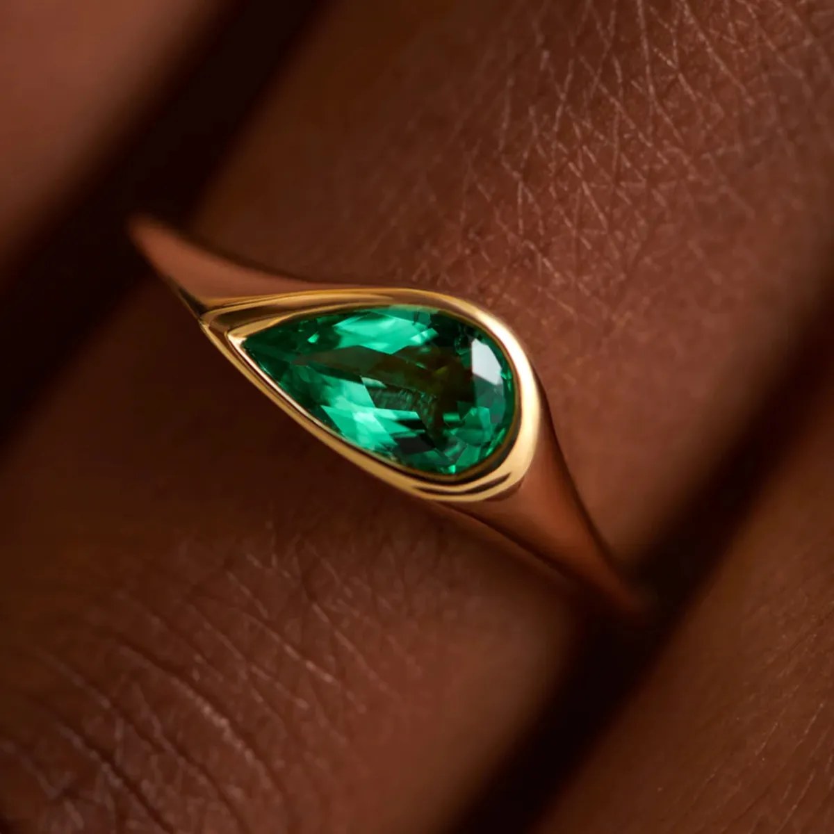 Tomfoolery Emerald Pear Cut Solitaire Ring Discount