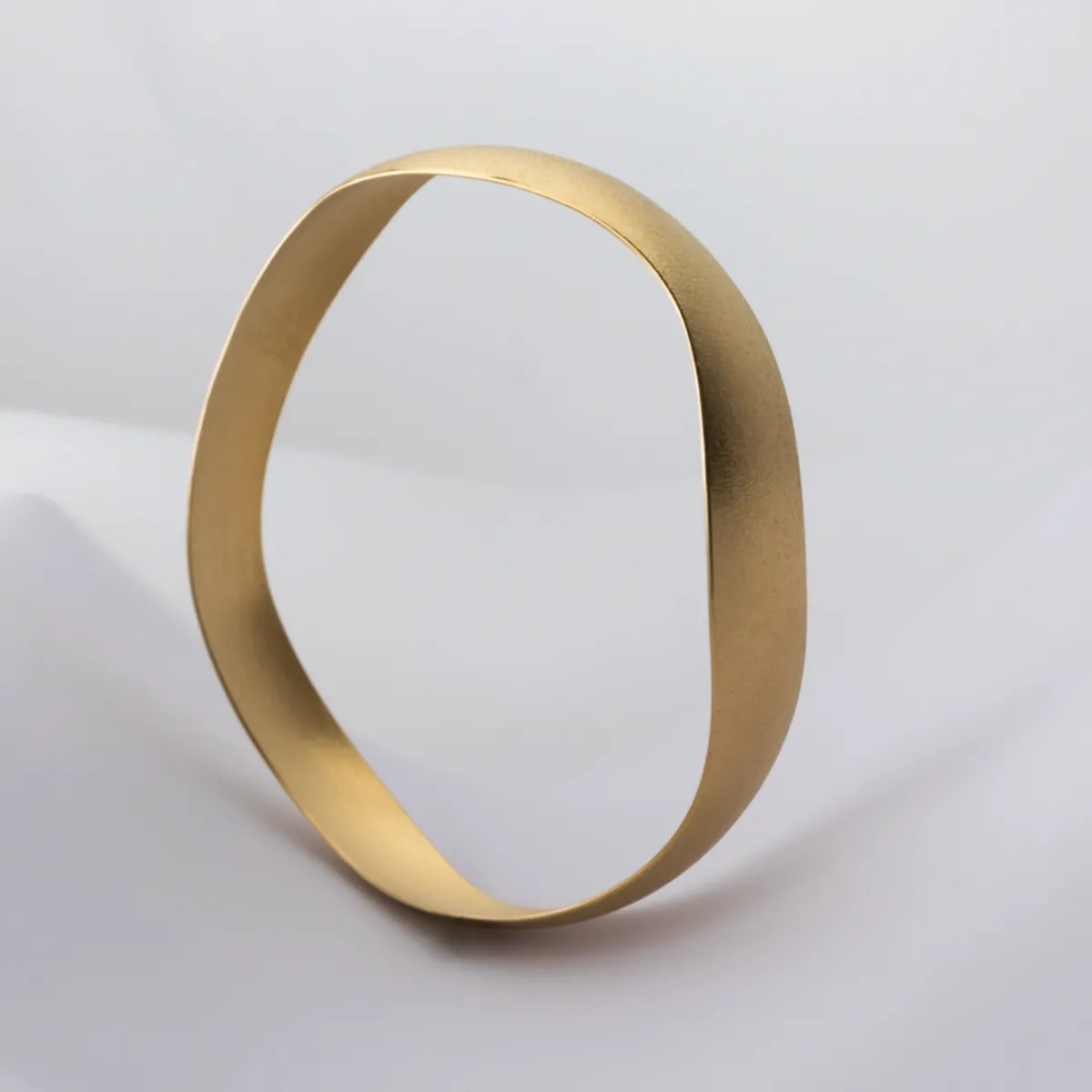 Tomfoolery Gold Plated Wide Wave Bangle Outlet