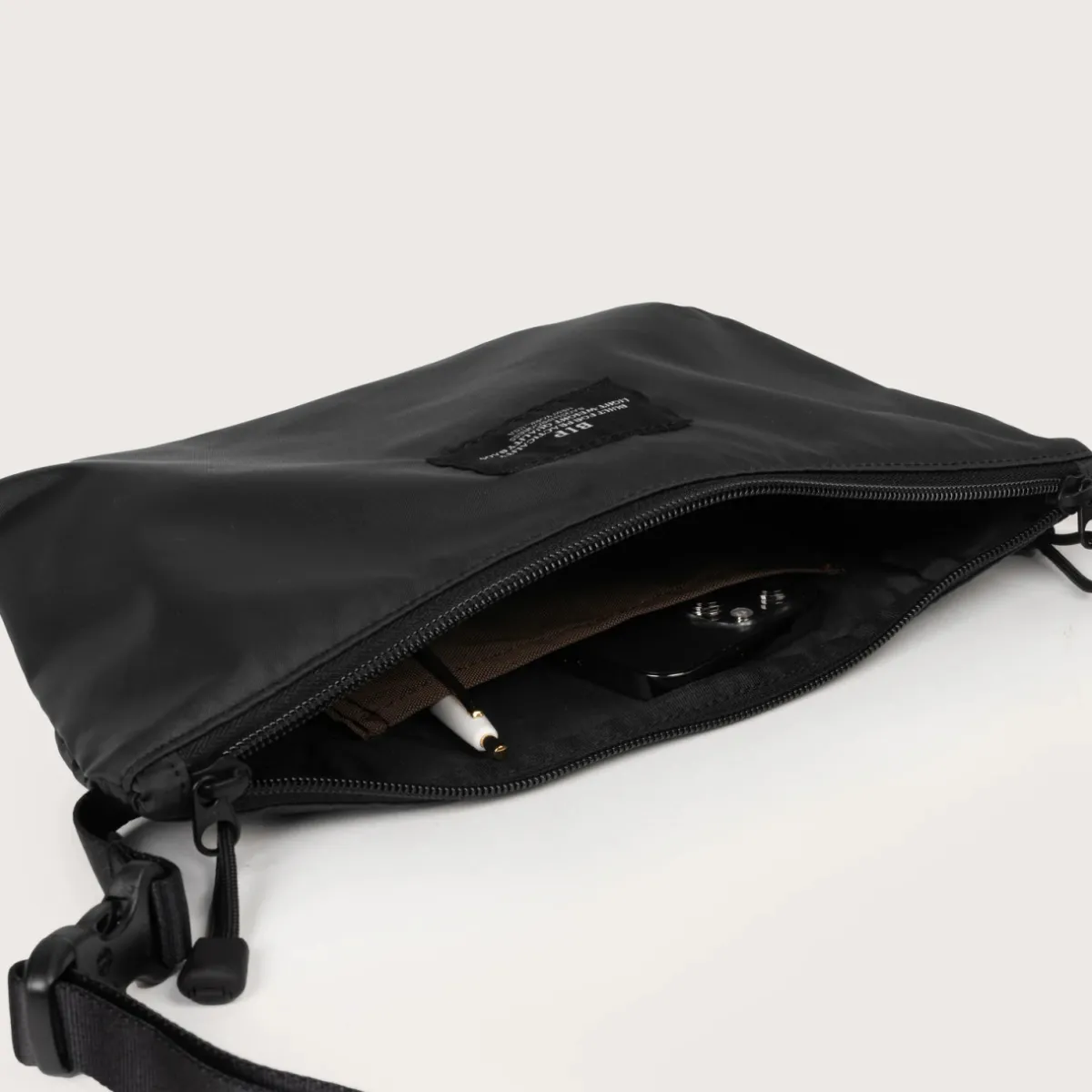 Tomfoolery Nylon Twill Fannypack Crossbody in Black Fashion