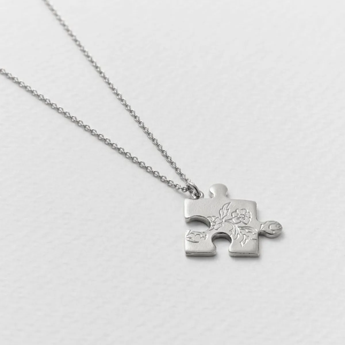 Tomfoolery Silver Floral Puzzle Piece Necklace Hot