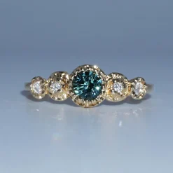 Tomfoolery Teal Sapphire Encounter Ring Discount